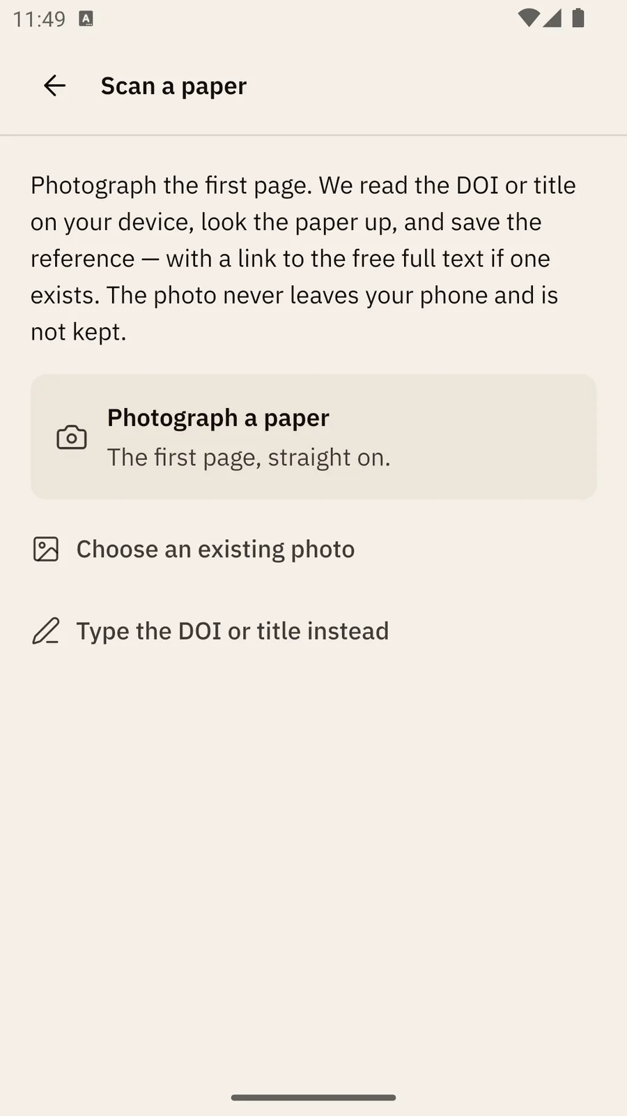 The Scan a paper screen: a note that the photo never leaves your phone, then Photograph a paper, Choose an existing photo and Type the DOI or title instead.